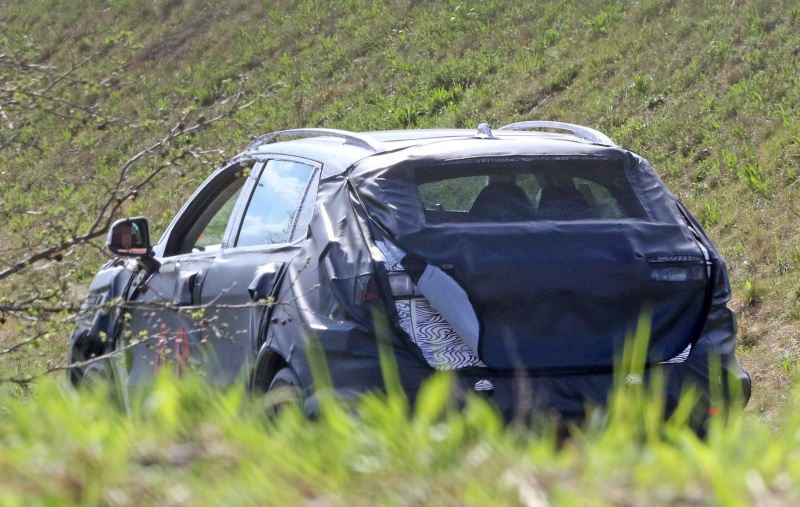 Illustration for article titled Identify this mystery SUV